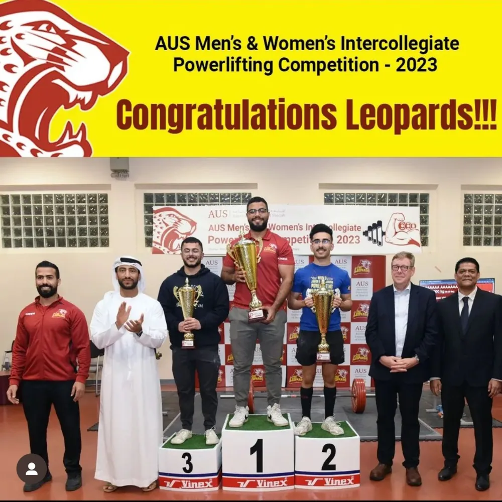 Medhat Abouzeid standing first on the podium at the 2023 AUS intercollegiate powerlifting competition